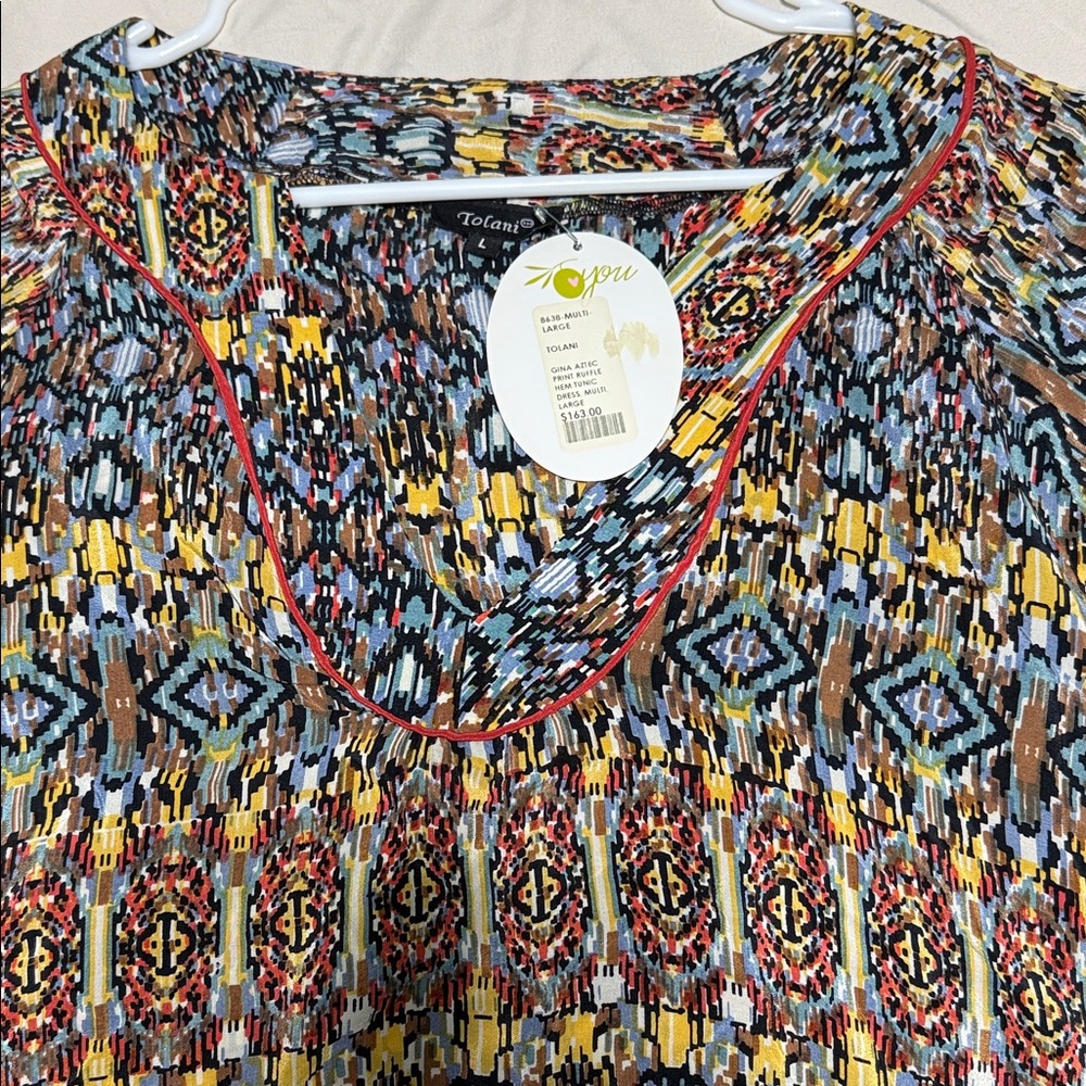 Tolani 100% silk Tunic Dress.Gina Aztec print. Ruffle hem. Size large. New w tag